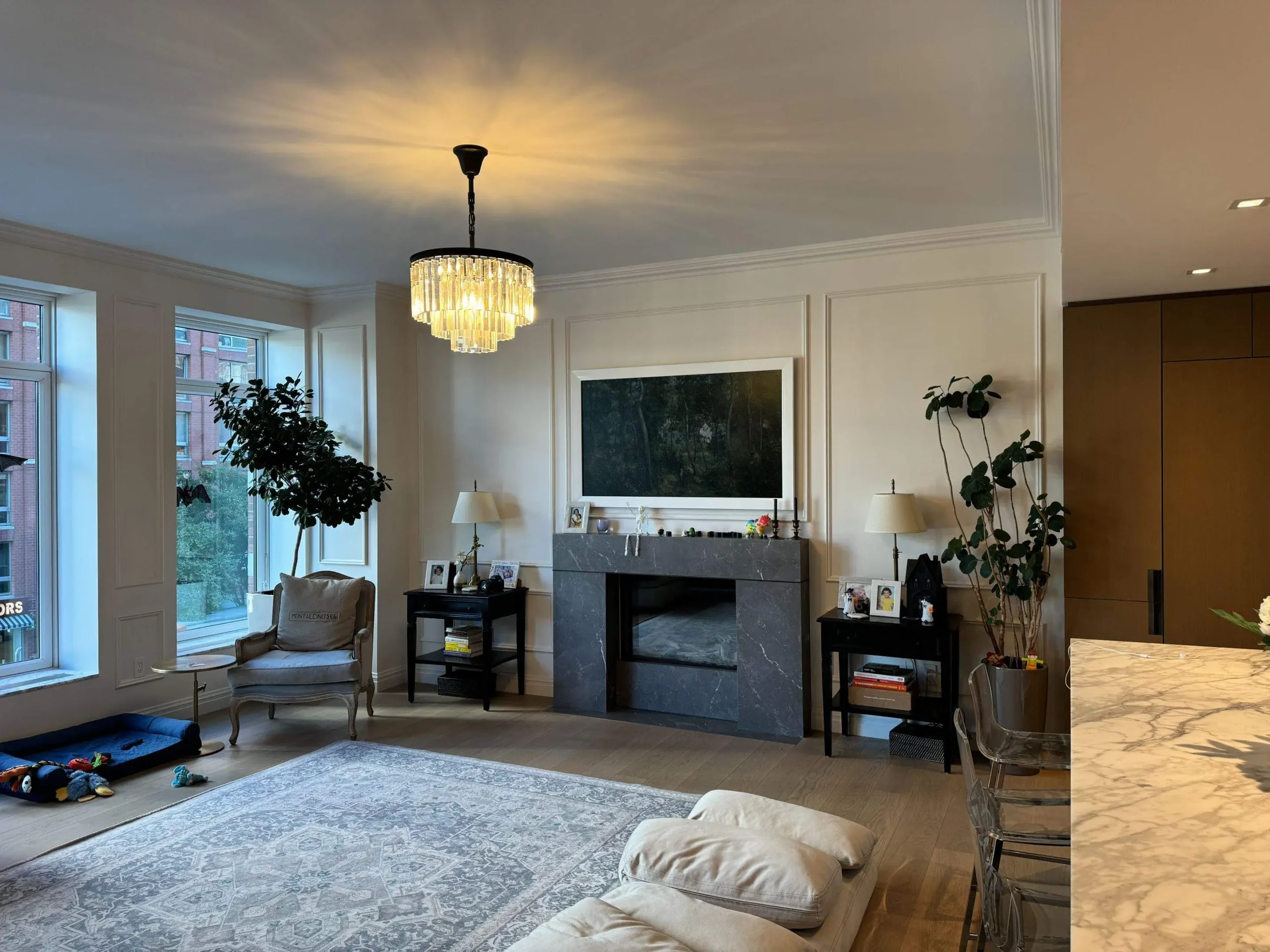 One savvy homeowner asked us to renovate her light-filled living room with wall molding and fresh paint. Wall molding has a storied history beginning with Greek and Roman architecture.