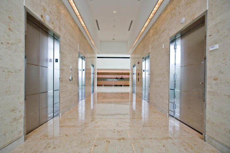 Polishing stainless steel elevator doors